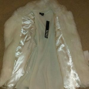 White fur vest